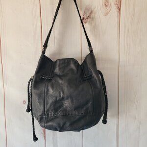 The Sak Black Leather Drawstring Bucket Bag Purse, Pebbled Leather Braided Strap